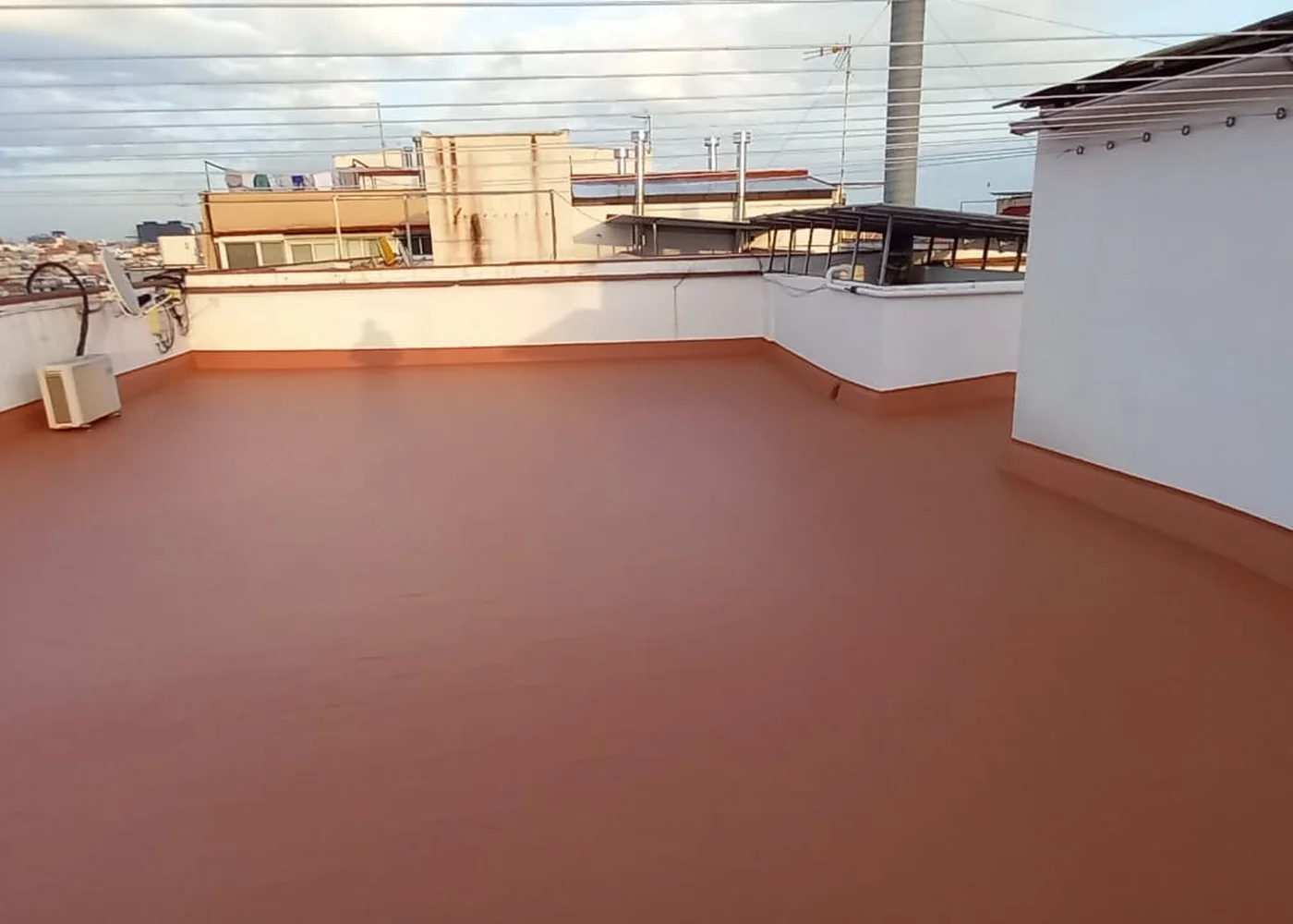 Terrado comunitario impermeabilizado por Reformas Oliver